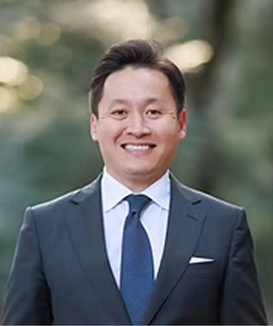 代表取締役 韓 敬三（サム）の写真